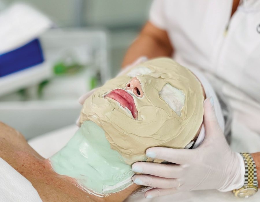 Mineral mask applied over the seaweed mask during Layer 4 of the Repechage Four Layer Facial